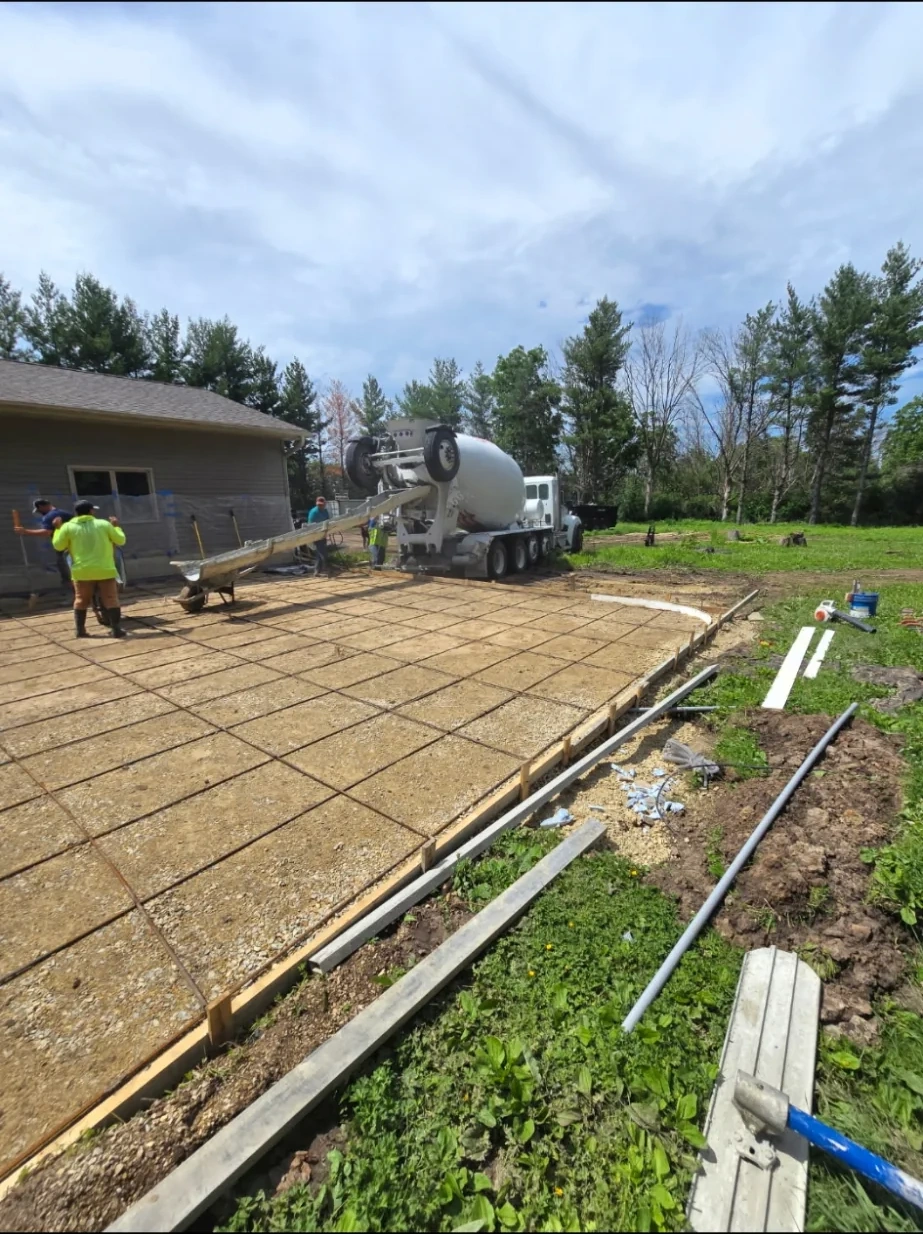 Rebar in concrete forms during slab pour preparation in Rochester MN